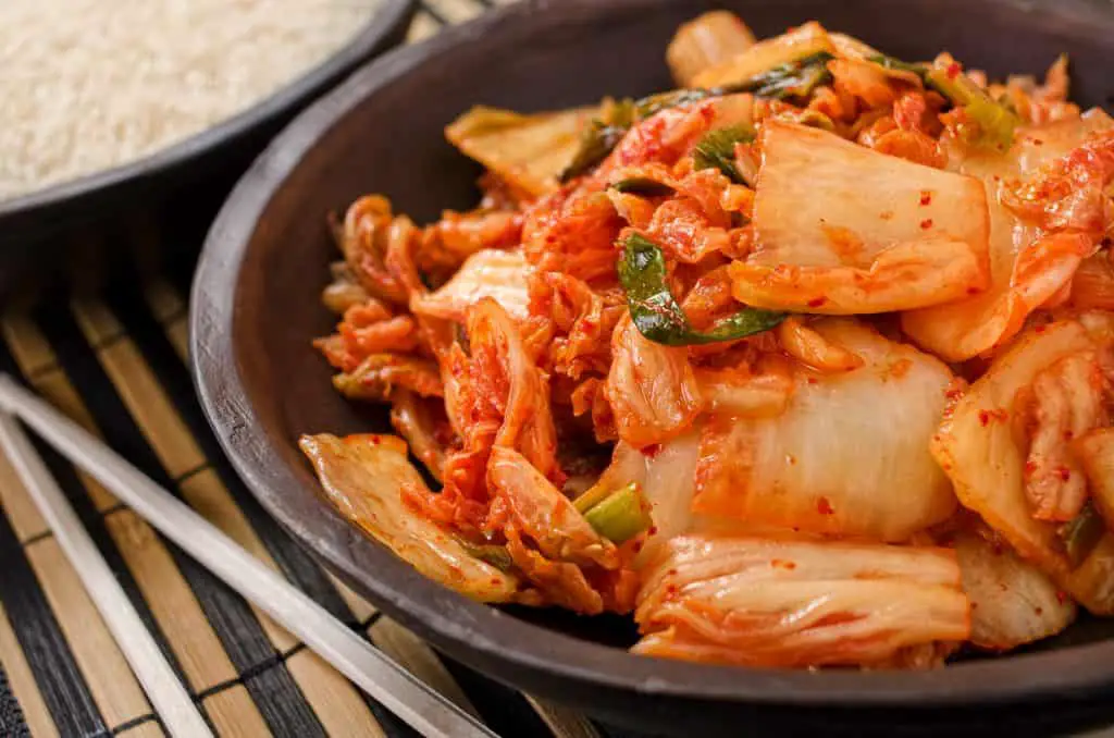 A bowl of traditional Korean napa cabbage Kimchi.