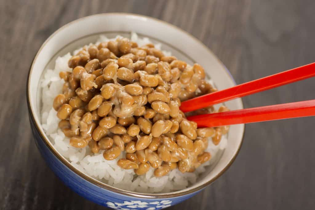 Natto is a Japanese dish made from fermented soybeans that is popular for breakfast. During the fermentation process, the soybeans become slimy and gooey.